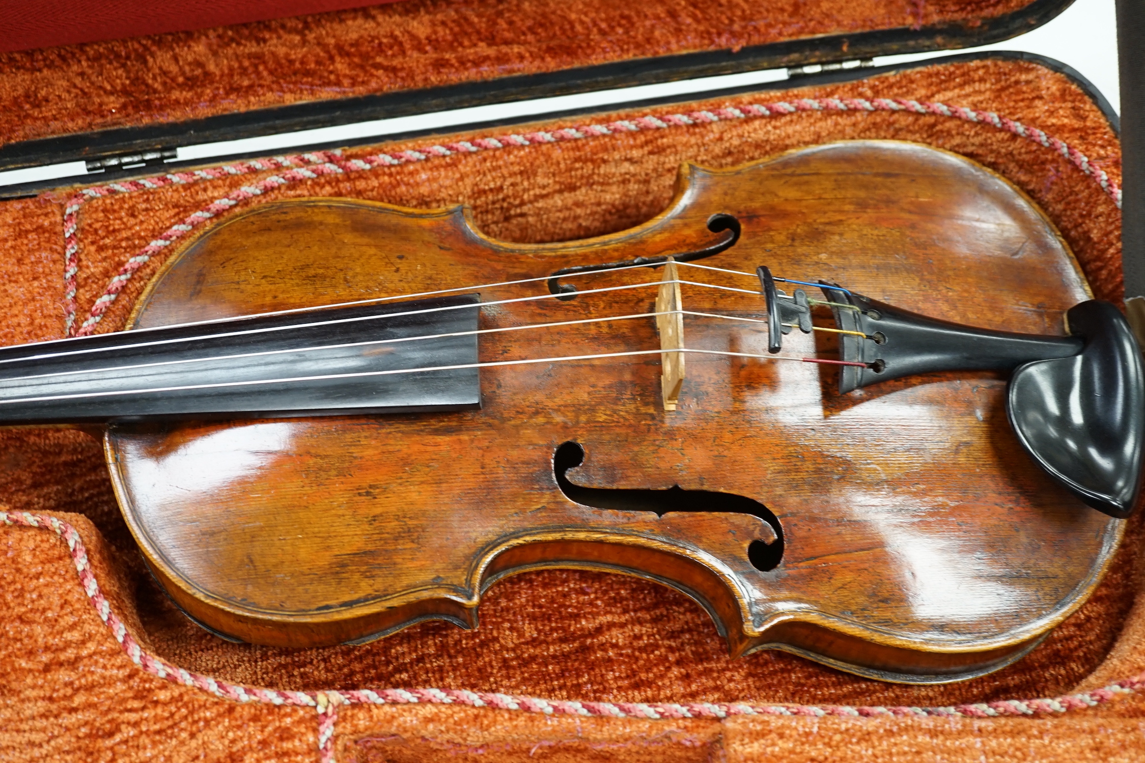 A cased 19th century German viola, length of body 39cm, in a good double case incorporating space for violin, without bow